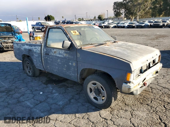 1991 Nissan Frontier z VIN 1N6SD11S2MC350332, wystawiony jako Copart lot #87462534 z przebiegiem 350 692 mil mil oraz Szkoda całkowita • Salvage title. Historia ofert i sprzedaży dostępna na DreamBid. Obrazek 4.