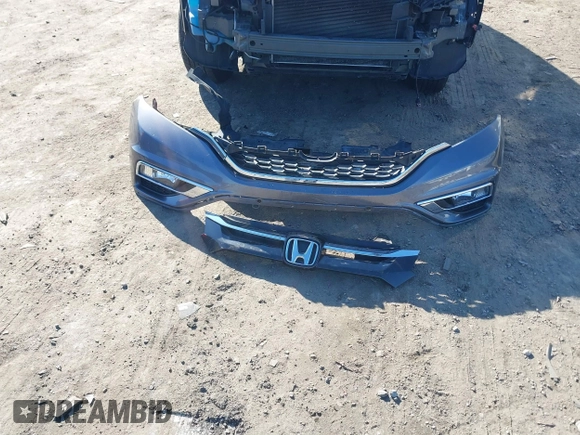 2016 Honda CR-V EX with VIN 5J6RM4H58GL095297, listed as a IAAI auction lot 41386994 with 154,595 mi miles and . Bid and sale history available at DreamBid. Image 11.