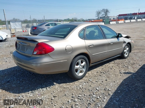2003 Ford Taurus SE Standard with VIN 1FAFP53U73A245044, listed as a IAAI auction lot 41999582 with 85,870 mi miles. Bid and sale history available at carsss.com. Image 4.