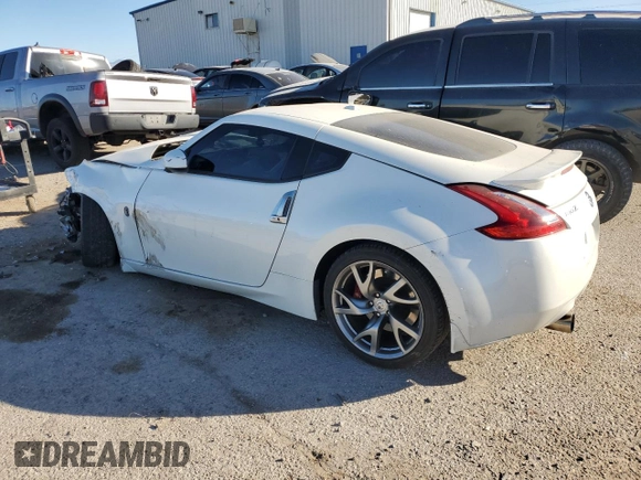 2014 Nissan 370Z Touring with VIN JN1AZ4EH5EM635783, listed as a Copart auction lot 85475214 with 107,712 mi miles and Salvage Title. Bid and sale history available at carsss.com. Image 2.