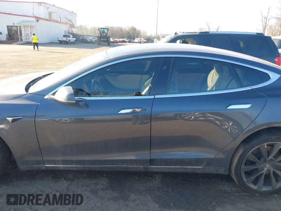 2019 Tesla Model S 75D with VIN 5YJSA1E2XKF331744, listed as a IAAI auction lot 41483173 with Not provided miles and . Bid and sale history available at DreamBid. Image 14.