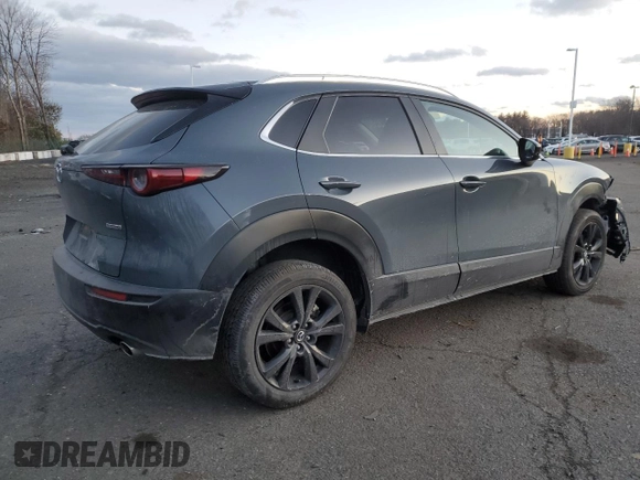 2023 Mazda CX-30 S Carbon Edition с VIN 3MVDMBCM3PM500403, выставлен на аукционе Copart как лот 88146095 с пробегом 29 861 миль миль и Списание • Salvage title. История ставок и продаж доступна на DreamBid. Изображение 3.