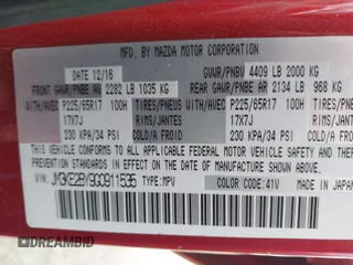 2016 Mazda CX-5 Sport with VIN JM3KE2BY9G0911535, listed as a IAAI auction lot 41906402 with 134,477 mi miles. Bid and sale history available at carsss.com. Image 9.