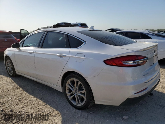 2020 Ford Fusion Titanium with VIN 3FA6P0RUXLR230201, listed as a Copart auction lot 52773875 with 72,788 mi miles and Salvage title. Bid and sale history available at DreamBid. Image 2.