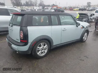 2013 MINI Cooper Clubman with VIN WMWZF3C56DT491108, listed as a IAAI auction lot 41734006 with 100,086 mi miles. Bid and sale history available at carsss.com. Image 4.