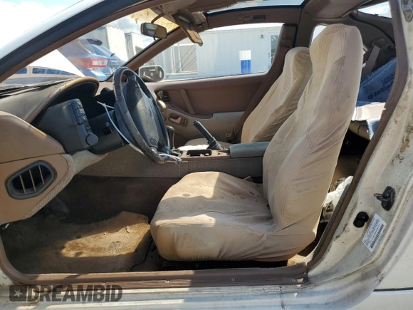 1991 Nissan 300ZX z VIN JN1RZ26H3MX504127, wystawiony jako Copart lot #74052424 z przebiegiem 48 904 mil mil oraz Szkody całkowita. Historia ofert i sprzedaży dostępna na DreamBid. Obrazek 7.