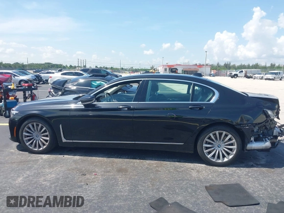 2022 BMW 7 Series 740i with VIN WBA7T2C02NCH73426, listed as a IAAI auction lot 42641007 with 49,300 mi miles and . Bid and sale history available at DreamBid. Image 15.