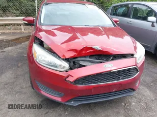 2015 Ford Focus SE with VIN 1FADP3F22FL259223, listed as a IAAI auction lot 42333439 with 77,111 mi miles and . Bid and sale history available at DreamBid. Image 6.