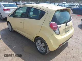 2013 Chevrolet Spark LT with VIN KL8CD6S99DC579079, listed as a IAAI auction lot 42090297 with 101,985 mi miles. Bid and sale history available at carsss.com. Image 3.