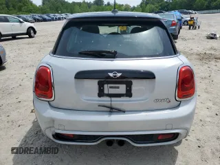 2015 MINI Hardtop 4 Door S with VIN WMWXU3C5XF2B56555, listed as a Copart auction lot 58775215 with 101,426 mi miles and Clean title. Bid and sale history available at DreamBid. Image 6.
