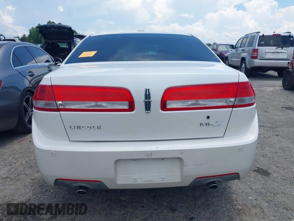 2012 Lincoln MKZ with VIN 3LNHL2GC8CR808103, listed as a IAAI auction lot 42506096 with 129,690 mi miles and . Bid and sale history available at DreamBid. Image 16.