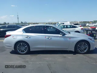 2019 Infiniti Q50 Luxe z VIN JN1EV7AP3KM510305, wystawiony jako IAAI lot #42225255 z przebiegiem 33 902 mil mil oraz . Historia ofert i sprzedaży dostępna na DreamBid. Obrazek 14.