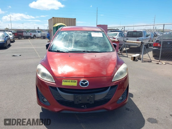2012 Mazda 5 Touring with VIN JM1CW2CLXC0113181, listed as a IAAI auction lot 42653061 with 94,441 mi miles and . Bid and sale history available at DreamBid. Image 6.