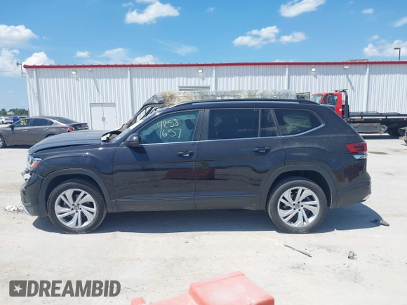 2021 Volkswagen Atlas SE with VIN 1V2WR2CAXMC586838, listed as a IAAI auction lot 42581657 with 60,922 mi miles and . Bid and sale history available at DreamBid. Image 14.