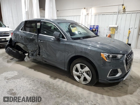 2022 Audi Q3 Premium with VIN WA1AUCF33N1002302, listed as a Copart auction lot 51973985 with 49,886 mi miles and Salvage title. Bid and sale history available at DreamBid. Image 4.