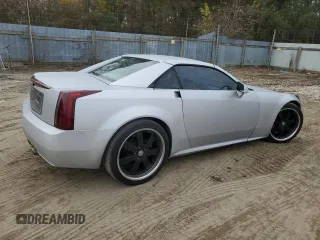 2005 Cadillac XLR z VIN 1G6YV34AX55603706, wystawiony jako Copart lot #81643824 z przebiegiem 84 951 mil mil oraz Czysty tytuł • Clean title. Historia ofert i sprzedaży dostępna na DreamBid. Obrazek 3.