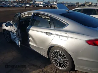 2017 Ford Fusion Hybrid Titanium with VIN 3FA6P0RU8HR190482, listed as a IAAI auction lot 41322244 with 137,539 mi miles and . Bid and sale history available at DreamBid. Image 17.