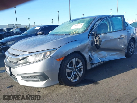 2018 Honda Civic LX with VIN 2HGFC2F58JH571072, listed as a IAAI auction lot 41684450 with 66,032 mi miles and . Bid and sale history available at carsss.com. Image 6.