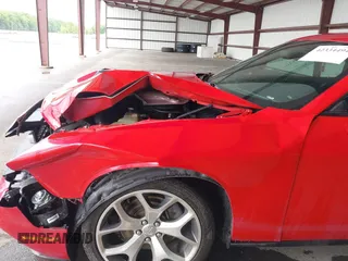 2016 Dodge Challenger SXT Plus z VIN 2C3CDZAG3GH114117, wystawiony jako IAAI lot #42334494 z przebiegiem 131 667 mil mil oraz . Historia ofert i sprzedaży dostępna na DreamBid. Obrazek 6.