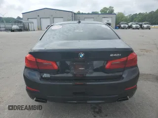 2018 BMW 5 Series 540i with VIN WBAJE5C54JWA93338, listed as a Copart auction lot 54312385 with 77,537 mi miles and Salvage title. Bid and sale history available at DreamBid. Image 6.