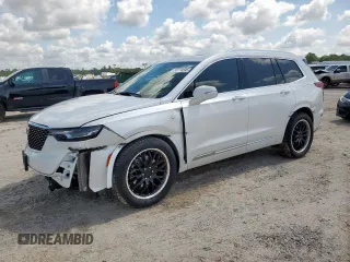 2021 Cadillac XT6 Premium Luxury with VIN 1GYKPDRS5MZ233884, listed as a Copart auction lot 58774595 with 47,490 mi miles and Salvage title. Bid and sale history available at DreamBid. Image 1.
