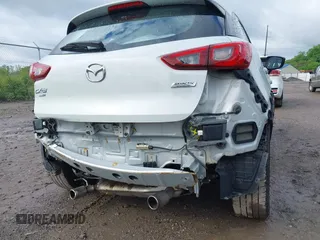2017 Mazda CX-3 Touring z VIN JM1DKFC7XH0141919, wystawiony jako IAAI lot #42333679 z przebiegiem 93 234 mil mil oraz . Historia ofert i sprzedaży dostępna na DreamBid. Obrazek 6.