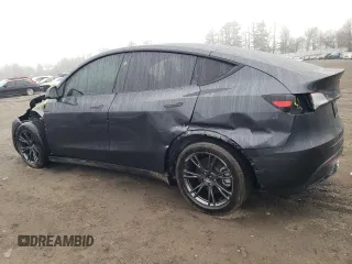 2025 Tesla Model Y Long Range z VIN 7SAYGDED9SF269767, wystawiony jako Copart lot #51588985 z przebiegiem 1 943 mil mil oraz Szkoda całkowita • Salvage title. Historia ofert i sprzedaży dostępna na DreamBid. Obrazek 2.