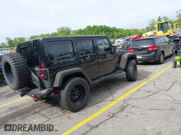 2014 Jeep Wrangler Unlimited Sahara с VIN 1C4BJWEG0EL248401, выставлен на аукционе IAAI как лот 42306970 с пробегом 134 904 миль миль и . История ставок и продаж доступна на DreamBid. Изображение 4.