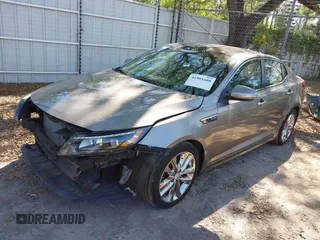 2014 Kia Optima SXL Turbo with VIN 5XXGR4A69EG284510, listed as a IAAI auction lot 41901608 with 81,877 mi miles and . Bid and sale history available at DreamBid. Image 2.