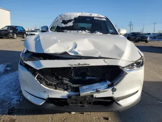 2021 Mazda CX-5 Touring with VIN JM3KFBCM9M0336910, listed as a Copart auction lot 48032275 with 65,515 mi miles and Salvage Title. Bid and sale history available at carsss.com. Image 5.