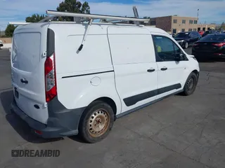 2014 Ford Transit Connect XL z VIN NM0LS7E76E1150196, wystawiony jako IAAI lot #39793323 z przebiegiem 149 656 mil mil oraz . Historia ofert i sprzedaży dostępna na DreamBid. Obrazek 4.
