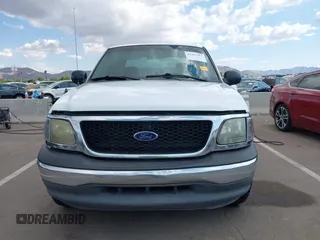 2003 Ford F-150 XL with VIN 1FTRX17L43NB82477, listed as a IAAI auction lot 42427957 with Not provided miles and . Bid and sale history available at DreamBid. Image 12.