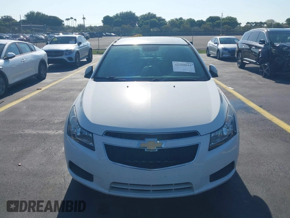 2014 Chevrolet Cruze 2LT z VIN 1G1PE5SB4E7340318, wystawiony jako IAAI lot #42268044 z przebiegiem Nie podano mil oraz . Historia ofert i sprzedaży dostępna na DreamBid. Obrazek 12.