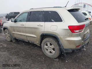 2011 Jeep Grand Cherokee Laredo with VIN 1J4RR4GG9BC563065, listed as a IAAI auction lot 41798136 with 192,149 mi miles. Bid and sale history available at carsss.com. Image 3.