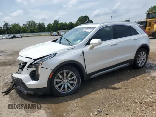 2019 Cadillac XT4 FWD Premium Luxury z VIN 1GYFZCR41KF127888, wystawiony jako Copart lot #55027135 z przebiegiem 111 057 mil mil oraz Szkody całkowita. Historia ofert i sprzedaży dostępna na DreamBid. Obrazek 1.
