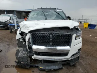 2022 Lincoln Navigator Black Label z VIN 5LMJJ3TT5NEL12844, wystawiony jako Copart lot #58589635 z przebiegiem Nie podano mil oraz Szkoda całkowita • Salvage title. Historia ofert i sprzedaży dostępna na DreamBid. Obrazek 5.