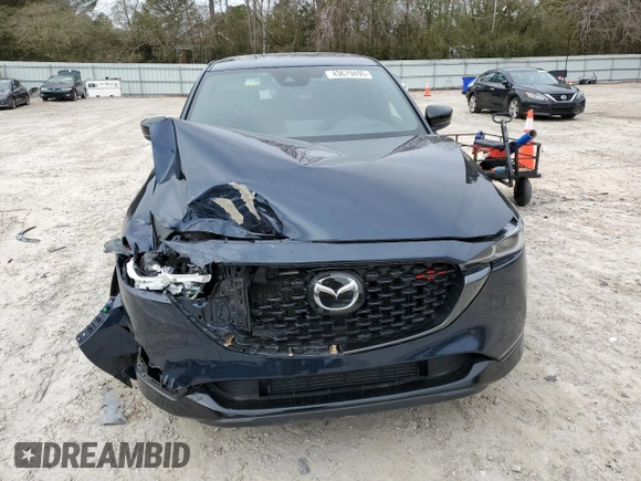 2022 Mazda CX-5 2.5 Turbo with VIN JM3KFBAY3N0603921, listed as a Copart auction lot 43679495 with 27,073 mi miles and Salvage Title. Bid and sale history available at carsss.com. Image 5.