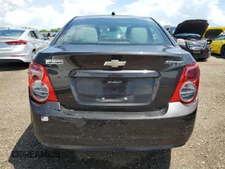 2014 Chevrolet Sonic LS with VIN 1G1JA5SH1E4241785, listed as a Copart auction lot 61914455 with 95,014 mi miles and Clean title. Bid and sale history available at DreamBid. Image 6.