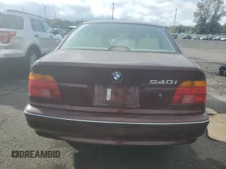 1997 BMW 5 Series 540iA with VIN WBADE6320VBW54072, listed as a Copart auction lot 74403104 with 98,910 mi miles and Clean Title. Bid and sale history available at carsss.com. Image 6.