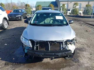 2009 Toyota Corolla with VIN 2T1BU40E49C155993, listed as a IAAI auction lot 41588637 with 183,548 mi miles. Bid and sale history available at carsss.com. Image 6.
