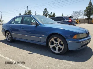 2001 BMW 5 Series 540i z VIN WBADN63441GM71806, wystawiony jako Copart lot #61294555 z przebiegiem 93 477 mil mil oraz Czysty tytuł • Clean title. Historia ofert i sprzedaży dostępna na DreamBid. Obrazek 4.