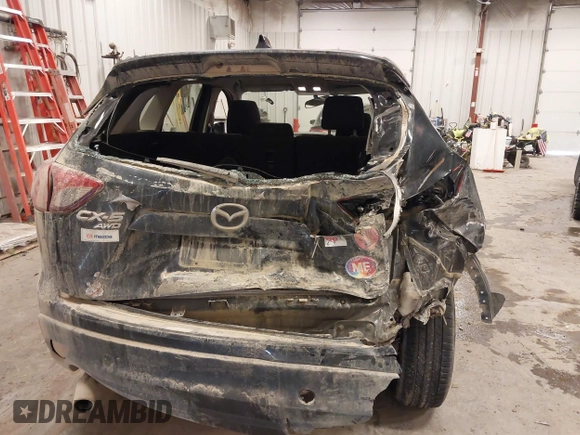 2015 Mazda CX-5 Sport with VIN JM3KE4BY0F0542655, listed as a IAAI auction lot 41471568 with 165,386 mi miles. Bid and sale history available at carsss.com. Image 6.