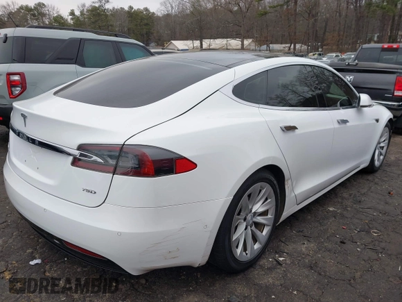 2016 Tesla Model S 90D with VIN 5YJSA1E26GF155962, listed as a IAAI auction lot 41348998 with 134,269 mi miles and . Bid and sale history available at DreamBid. Image 4.