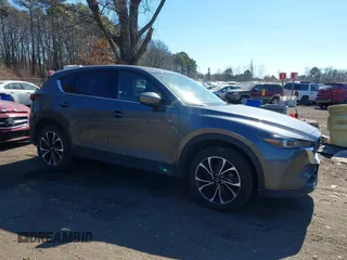 2023 Mazda CX-5 2.5 S Premium Plus Package with VIN JM3KFBEMXP0159401, listed as a IAAI auction lot 41657420 with 28,216 mi miles. Bid and sale history available at carsss.com. Image 13.