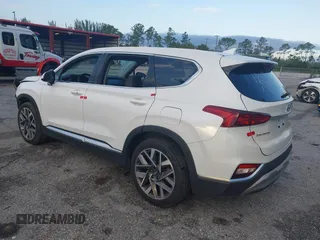 2019 Hyundai Santa Fe SEL with VIN 5NMS33AD0KH006550, listed as a IAAI auction lot 41894306 with 80,920 mi miles and . Bid and sale history available at DreamBid. Image 3.