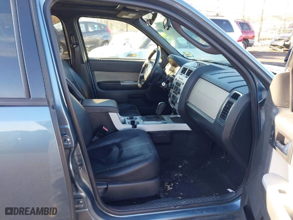 2010 Mercury Mariner with VIN 4M2CN9BG0AKJ02637, listed as a IAAI auction lot 41579241 with 128,095 mi miles. Bid and sale history available at carsss.com. Image 5.