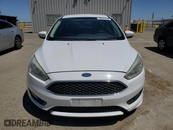 2016 Ford Focus SE with VIN 1FADP3F22GL329241, listed as a Copart auction lot 58095135 with 105,079 mi miles and Salvage title. Bid and sale history available at DreamBid. Image 5.