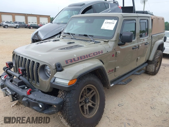 2020 Jeep Gladiator Rubicon z VIN 1C6JJTBG6LL179541, wystawiony jako IAAI lot #42050510 z przebiegiem 52 784 mil mil oraz . Historia ofert i sprzedaży dostępna na DreamBid. Obrazek 16.