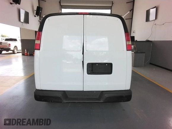 2013 Chevrolet Express Cargo with VIN 1GCWGFBA5D1138521, listed as a IAAI auction lot 42785471 with 157,254 mi miles and . Bid and sale history available at DreamBid. Image 14.