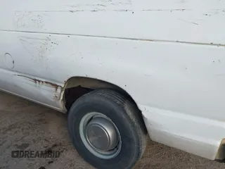 1999 Ford Econoline Cargo Commercial with VIN 1FTNE24L3XHB84868, listed as a IAAI auction lot 41151145 with 450,651 mi miles and . Bid and sale history available at carsss.com. Image 15.